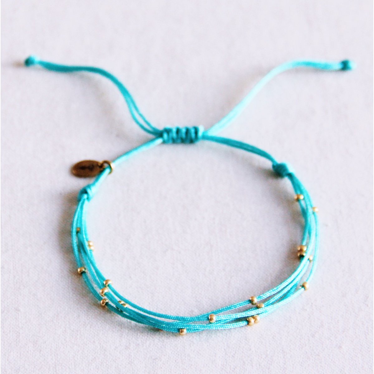 Kwartet satinarmband met kralen - muntgroen