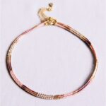 Kralenketting nude/wit/taupe