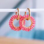 Oorrel met ronde facet hanger - fuchsia